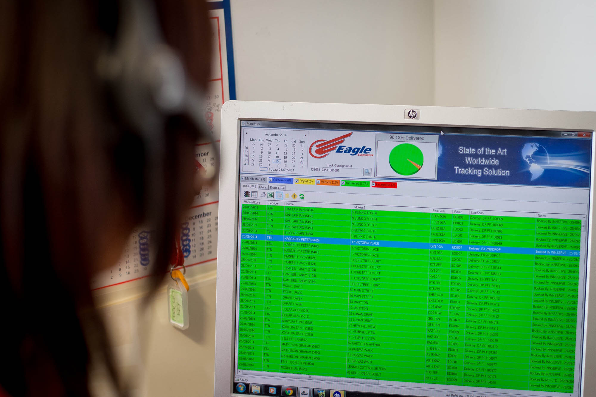 Control room staff at work with Eagle Couriers in Scotland