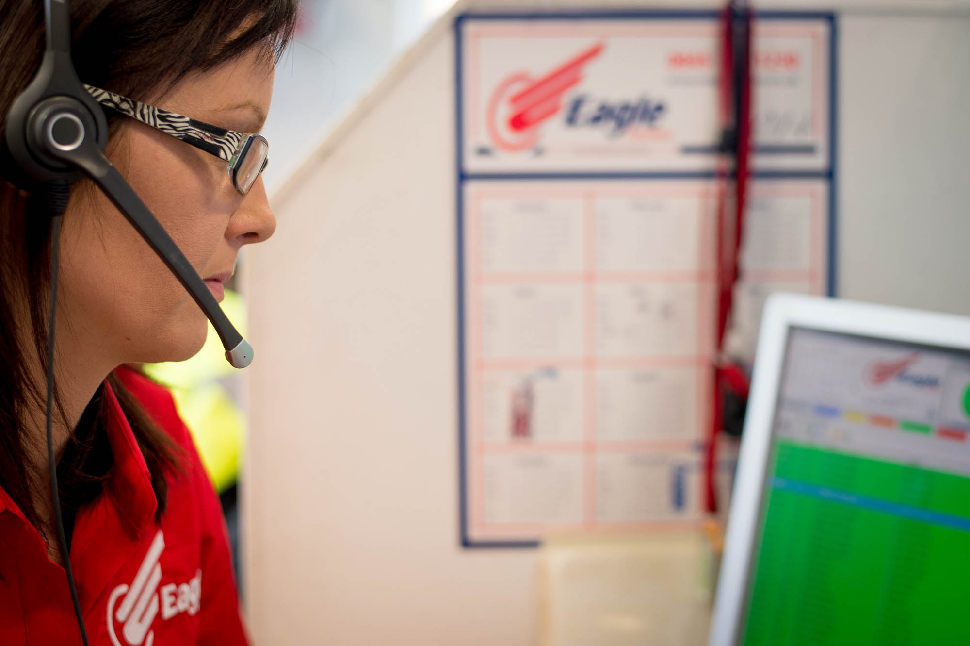 Control room staff at work with Eagle Couriers in Scotland