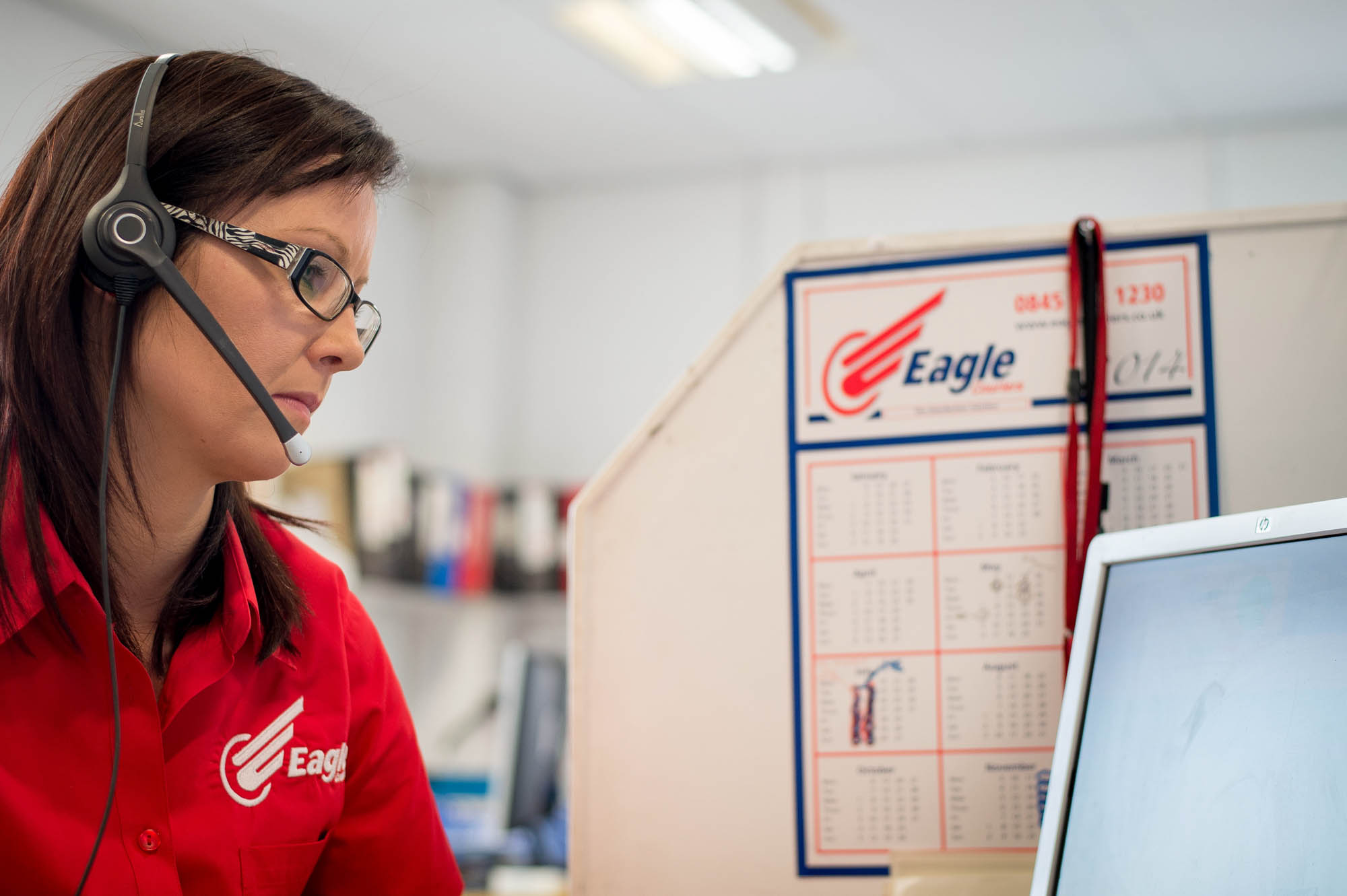 Control room staff at work in Eagle Couriers