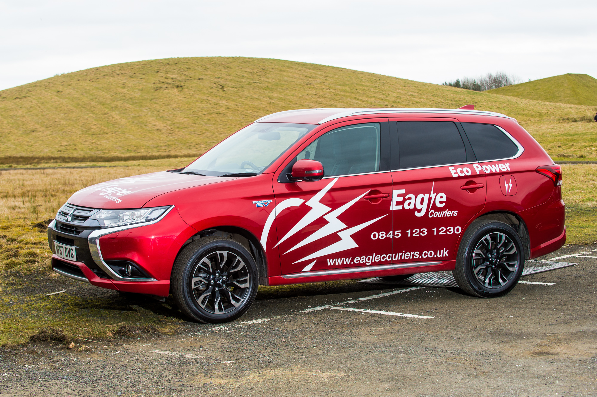 Mitsubishi Hybid EV operated by Eagle Couriers in Scotland