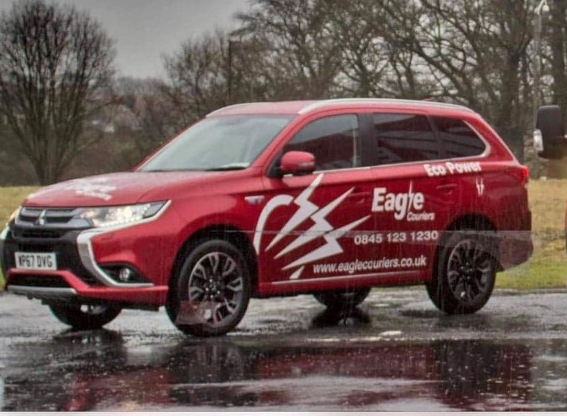 Mitsubisih Hybrid Electric Vehicle operated by Eagle Couriers in Scotland