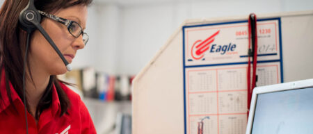 Control room staff at work in Eagle Couriers